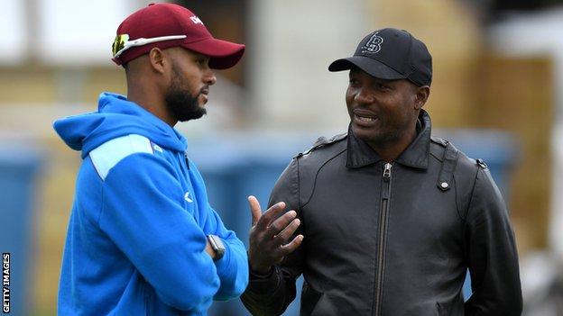 West Indies great Brian Lara (right) talks to current batsman Shai Hope (left) during a nets session in England in 2017