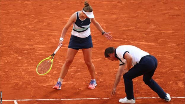 Barbora Krejcikova argues with umpire Pierre Bacchi astatine  the 2021 French Open