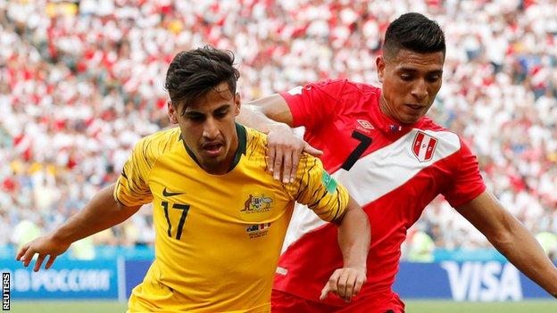 Daniel Arzani (left) in action for Australia against Peru in the 2018 World Cup