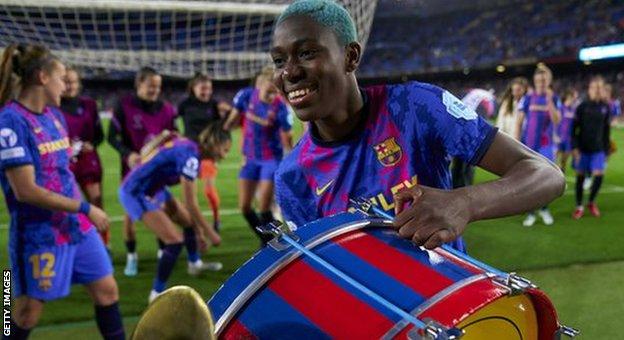 Barcelona and Nigeria striker Asisat Oshoala celebrates with a drum
