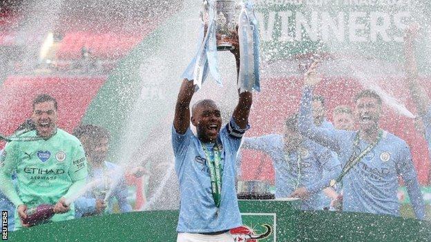 Fernandinho lifting League Cup