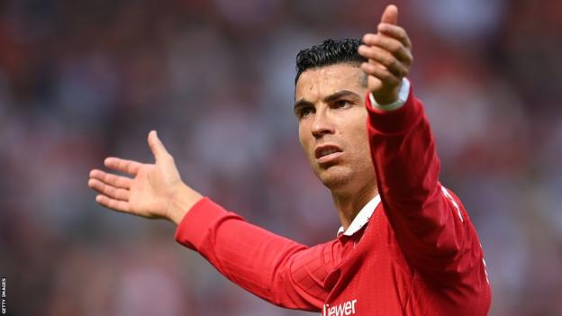 Cristiano Ronaldo gesticulates with his arms outstretched