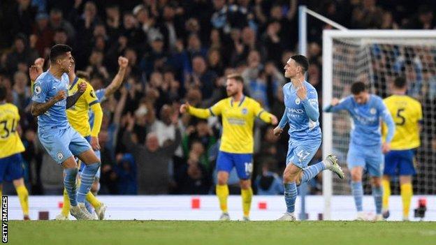 Phil Foden celebrates scoring Manchester City's second goal against Brighton