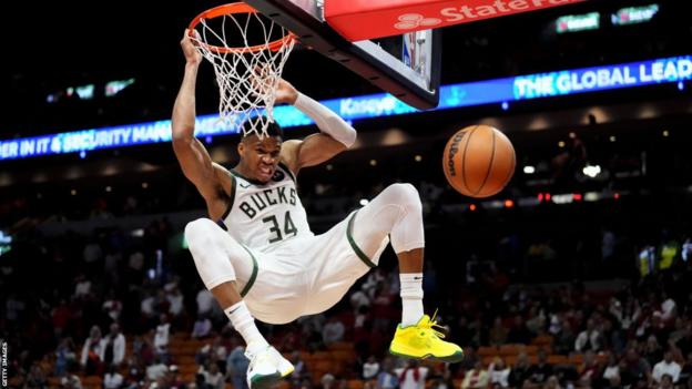 Giannis Antetokounmpo scores a basket for the Milwaukee Bucks