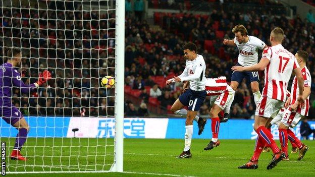 Harry Kane heads in his first goal for Tottenham against Stoke on Saturday