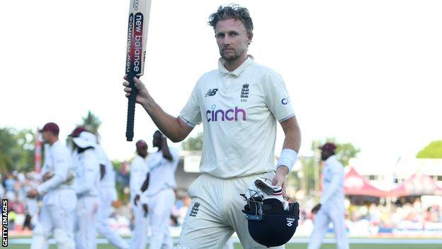 England captain Joe Root raises his bat to the crowd after day one of the second Test against West Indies