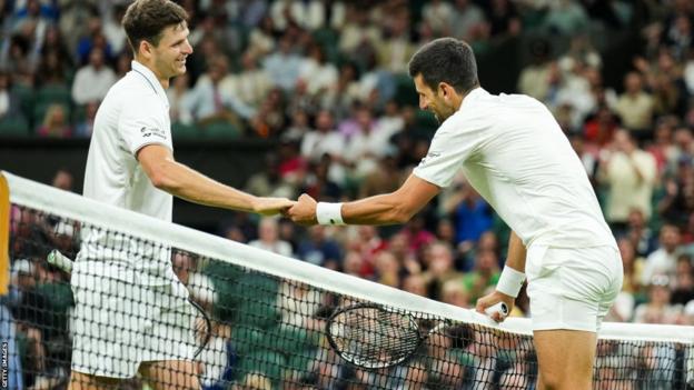 Novak Djokovic shakes hands with Hubert Hurkacz