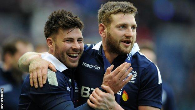 Scotland's Ali Price and Finn Russell celebrate against Wales