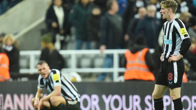 Newcastle's Anthony Gordon (right) react after their side's 2-0 home defeat to Liverpool