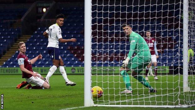 Cash scores 2 in Villa's 3-1 win at Burnley. Brick thrown at