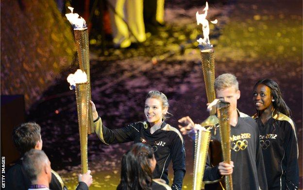 Desiree Henry and her six fellow torchbearers on the night of London 2012's opening ceremony