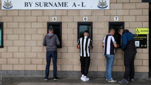 Newcastle fans collect tickets