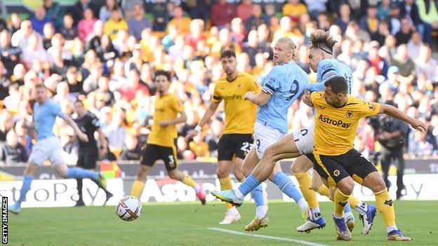 Jack Grealish gives Manchester City the lead against Wolves in the Premier League