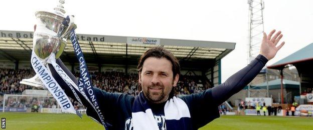 Paul Hartley with Championship trophy