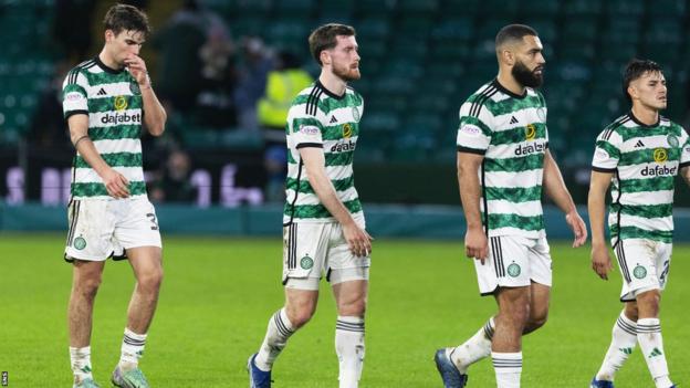 Celtic players leaving the field