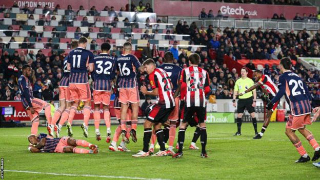 Ivan Toney scores a free-kick for Brentford against Nottingham Forest at the Gtech Community Stadium
