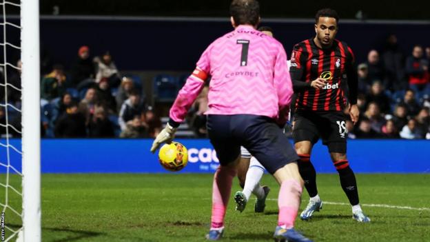 Justin Kluivert scores Bournemouth's third goal in their FA Cup third-round tie at Queens Park Rangers