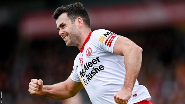 Darren McCurry celebrates a score against Armagh in Division One