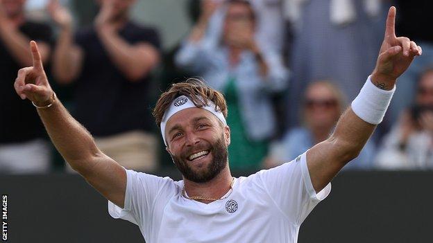 Liam Broady celebrates his second-round win at Wimbledon in 2021