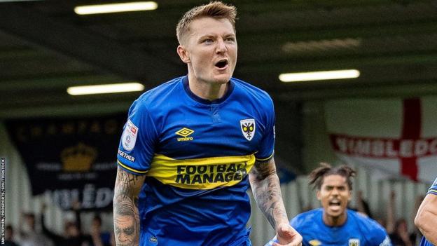 AFC Wimbledon 1-1 Wrexham: Late James Tilley penalty denies visitors first win since EFL return - BBC Sport