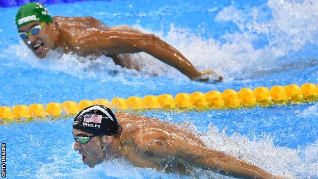 Michael Phelps (front) of the United States leads Chad le Clos of South Africa in the Men's 200m Butterfly Final on Day 4 of the Rio 2016 Olympic Games