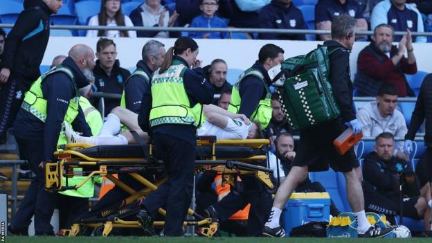 Southampton's Stuart Armstrong leaves the field on a stretcher