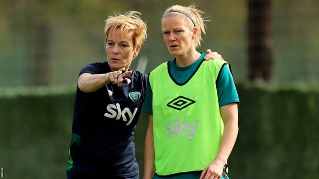 Diane Caldwell and Vera Pauw on the training pitch