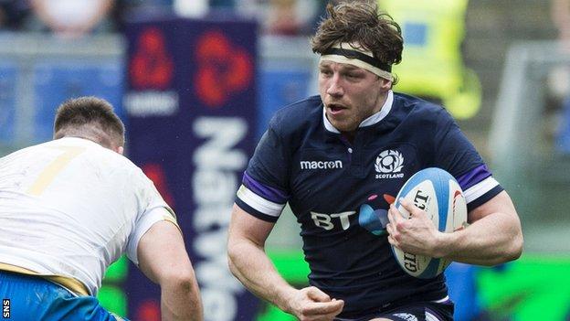 Hamish Watson carries the ball for Scotland against Italy