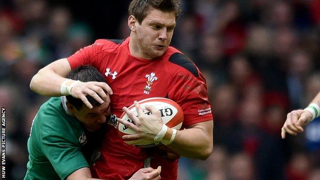 Johnny Sexton tackles Dan Biggar during Wales' win against Ireland in March 2015