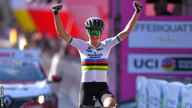 Annemiek van Vleuten celebrates as she crosses the finish line