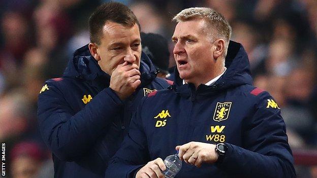 Aston Villa boss Dean Smith (right) with assistant manager John Terry during a cup tie with Liverpool