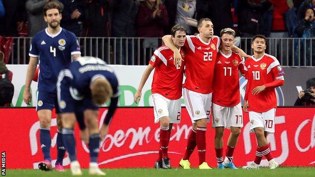 Russia celebrate a goal by Alexandr Golovin against Scotland