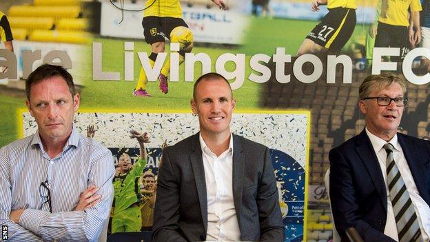 Livingston chief executive officer John Ward (left) and chairman Robert Martin (right) flank Kenny Miller after his unveiling as player-manager