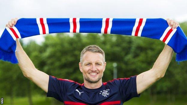 Clint Hill with a Rangers scarf