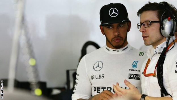 Lewis Hamilton and mechanic