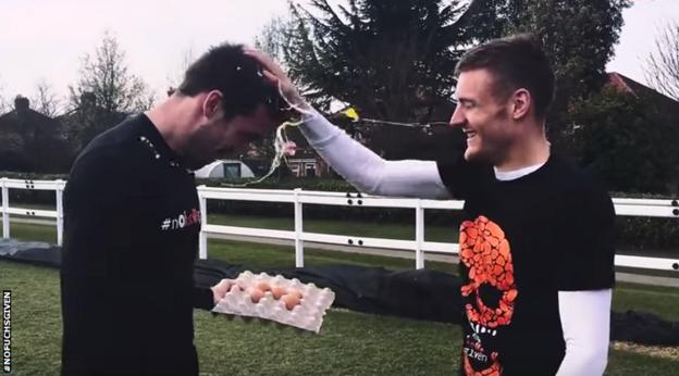 Jamie Vardy smashing an egg on Christian Fuchs's head