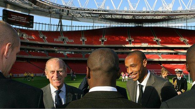 Prince Philip and Arsenal players including Thierry Henry at the opening of the Emirates Stadium in 2006