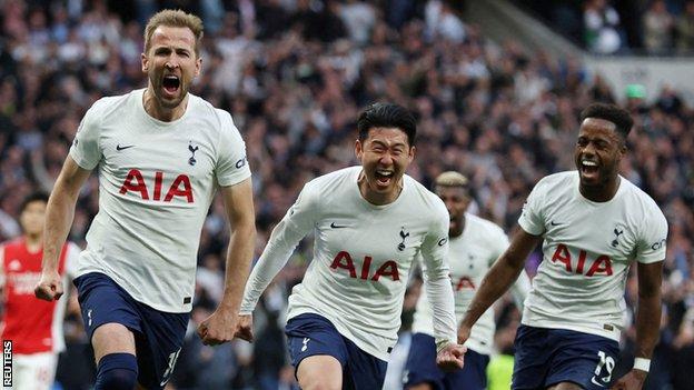 Harry Kane (left) celebrates scoring for Tottenham