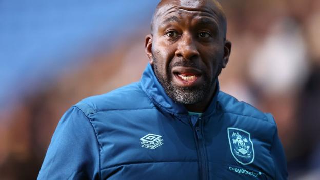 Darren Moore on his first night as Huddersfield Town boss