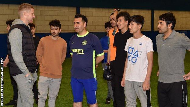 Wigan Athletic keeper Ben Amos was part of Wednesday's Afghan refugee football session