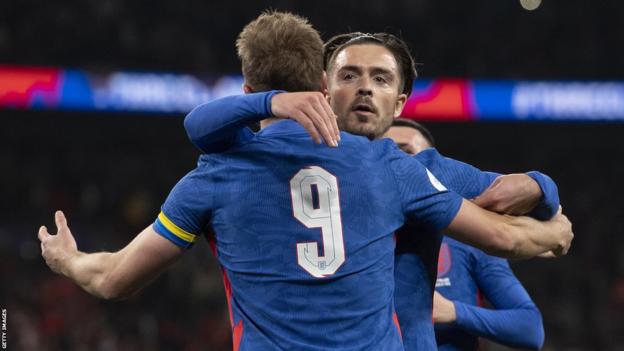 Harry Kane celebrates with Jack Grealish after scoring the winning goal against Switzerland in a friendly at Wembley in 2022