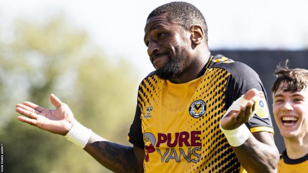 Omar Bogle celebrates