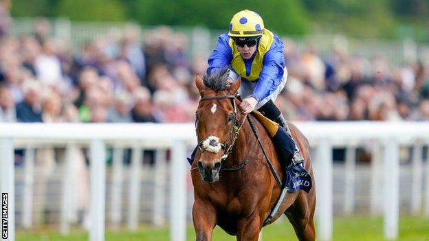 Richard Kingscote rides Desert Crown