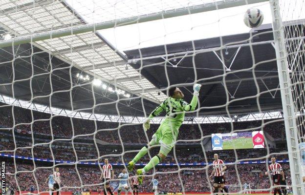 Yaya Toure scores City's equaliser against Sunderland in the 2014 League Cup final