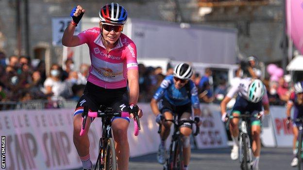 Anna van der Breggen punches the air as she celebrates winning the 2020 Giro Rosa