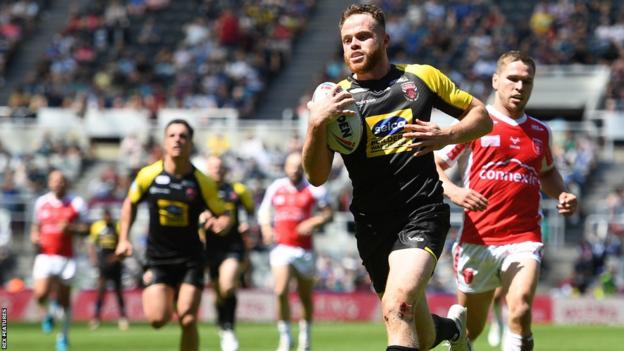 Joe Burgess of Salford Red Devils scores his side's first try against Hull KR