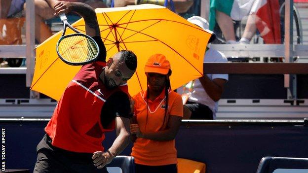 Nick Kyrgios smashes his racquet during the Miami Open defeat by Jannik Sinner