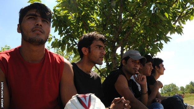 Refugees wait to bat at Belgrade's only cricket pitch