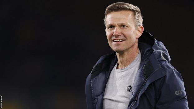 Leeds United head coach Jesse Marsch smiles during the Premier League win at Wolves in March