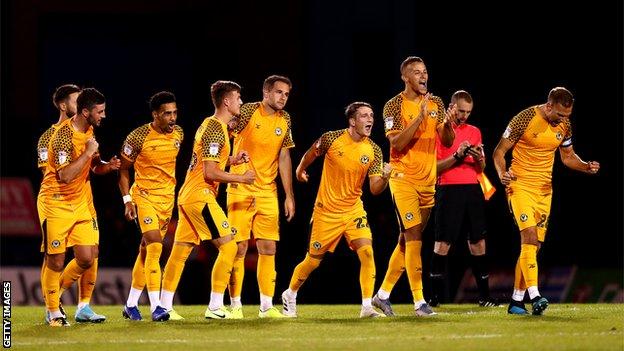 League Two side Newport beat Gillingham on penalties in the first round and will play West Ham in round two